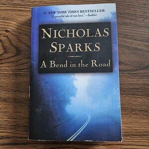 Blue Paperback Book Cover - A Bend in the Road